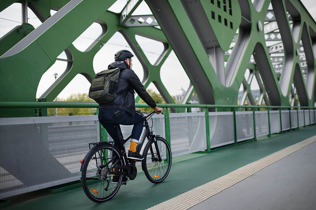 A cyclist biking to work