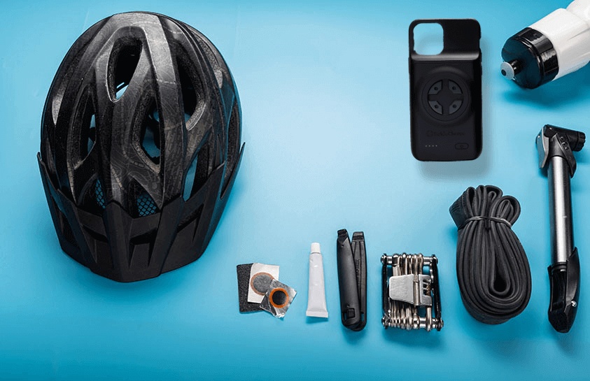 Biking accesories which include a helmet, phone charge case, water bottle, pump and more