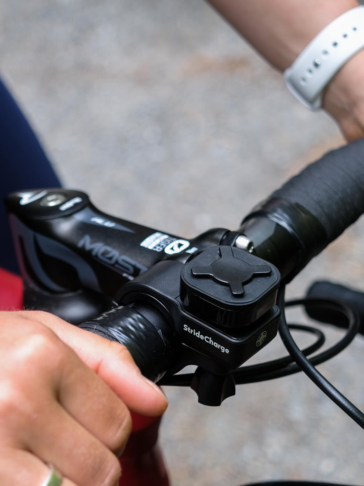 Close up of the Stride Bike Mount installed on a bicycle's handlebars